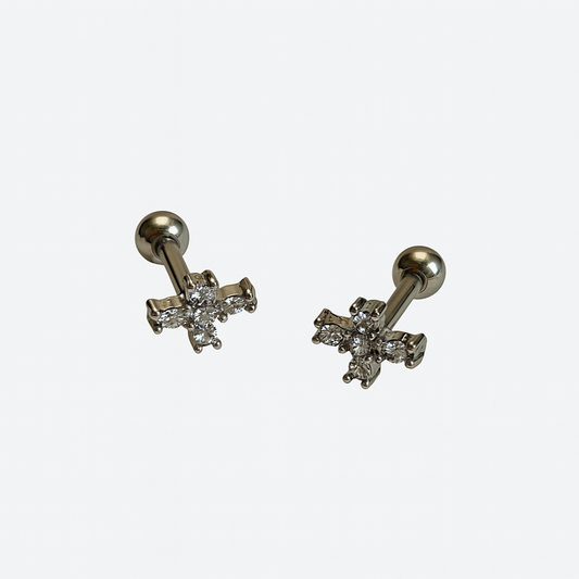 Piercing cruz circonias.