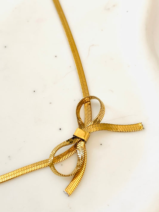 Collar Moño Dorado
